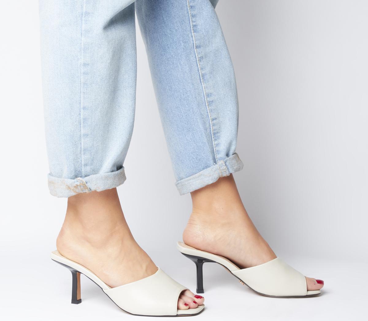 white mules with buckle