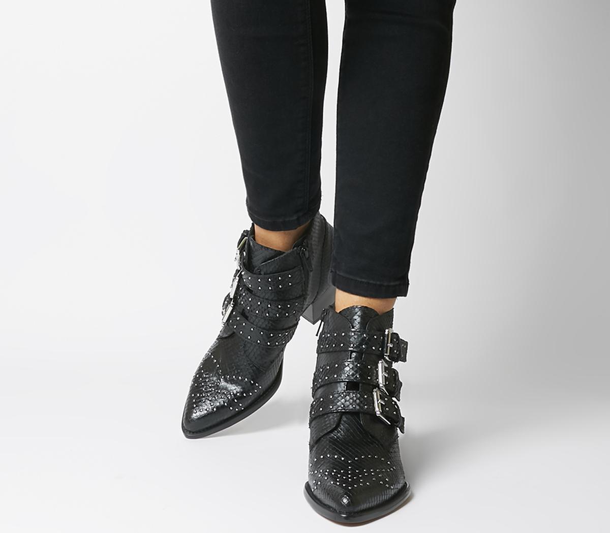 black boots with silver buckles
