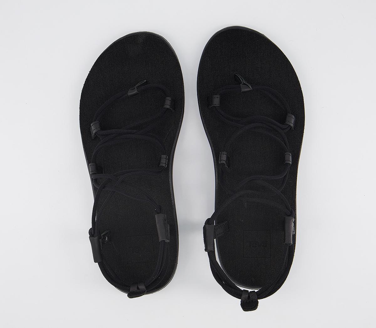 teva voya infinity lace up sandals in black