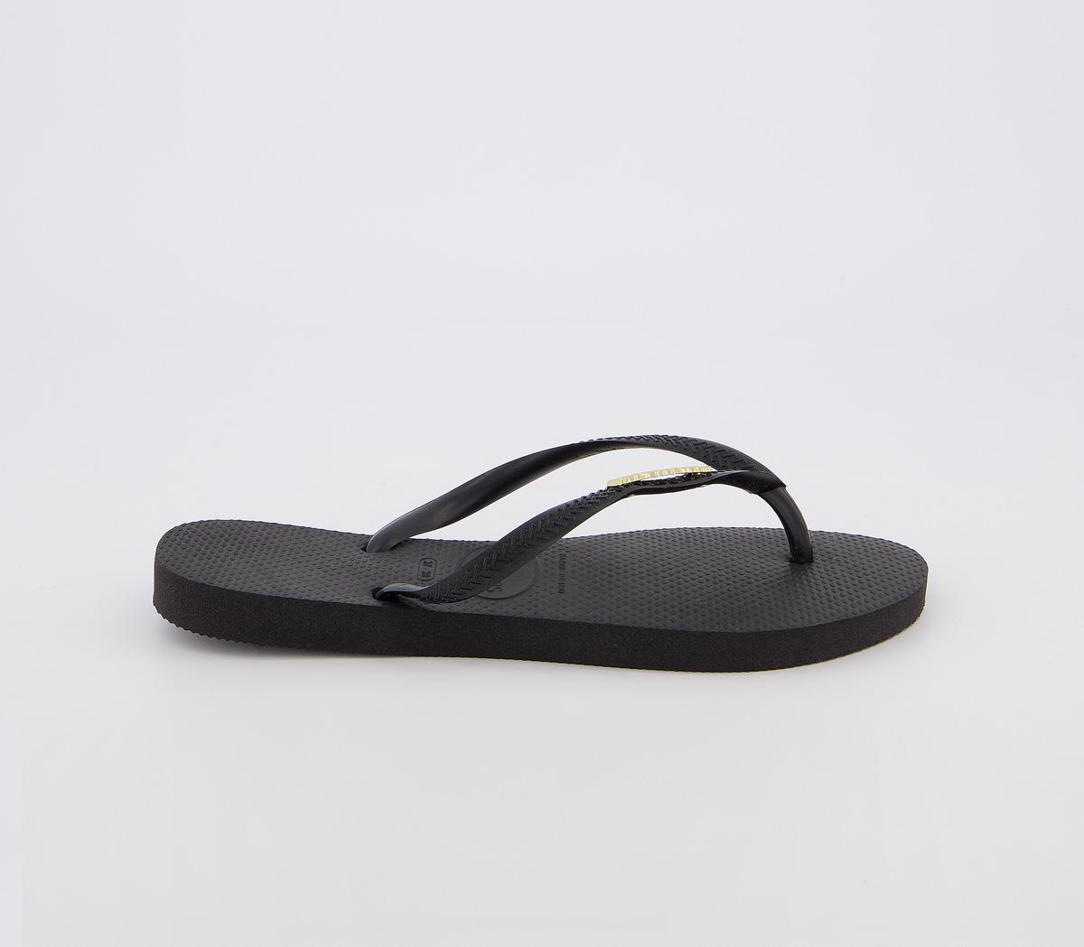 black havaianas with metal logo