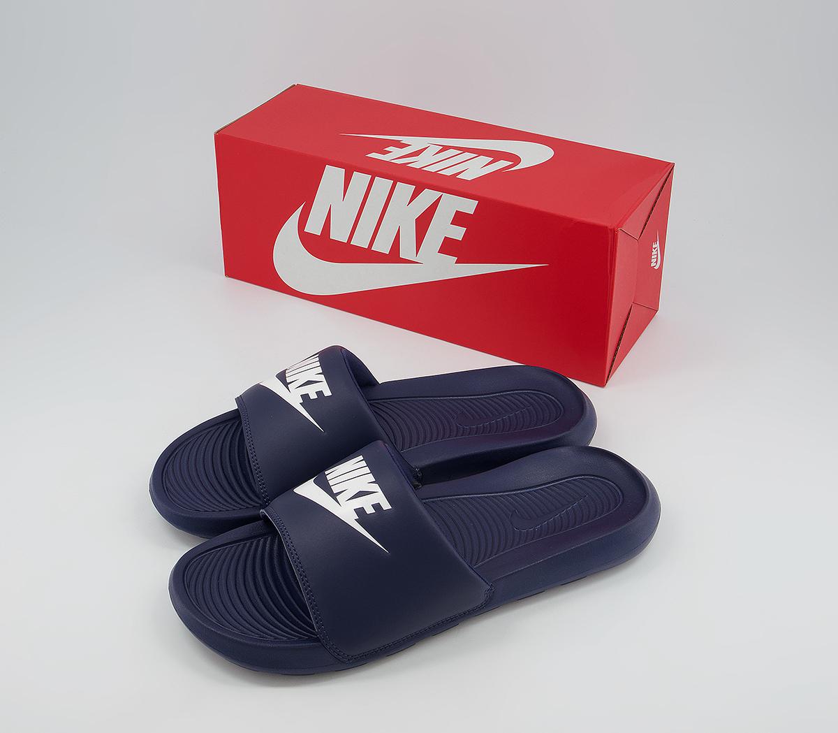 men blue nike slides