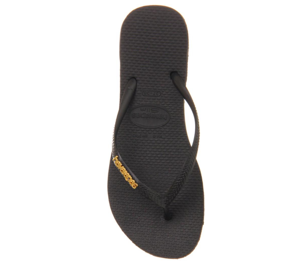 black havaianas with metal logo