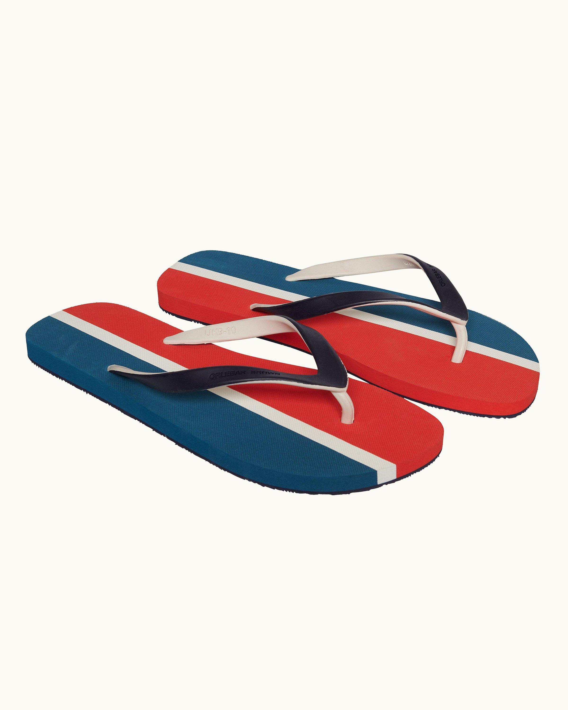 Red white and store blue flip flops