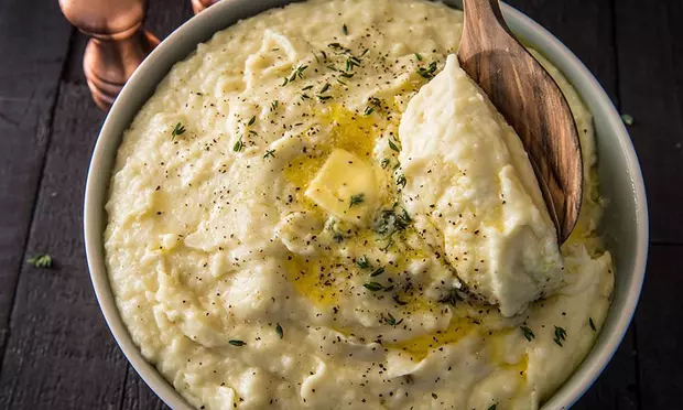 Rosemary and Thyme-Infused Mashed Potatoes with Cream