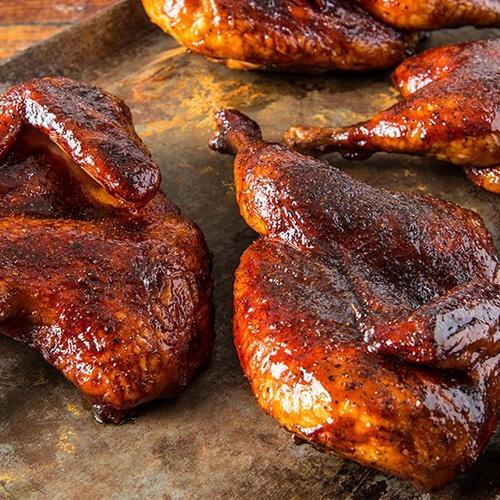 https://i8.amplience.net/i/traeger/BBQ-Halved-Chickens_Traeger-Wood-Pellet-Grills_RE_HE_M?scaleFit=poi%26%24poi2%24&fmt=auto&w=500&sm=aspect&aspect=1%3A1&qlt=default