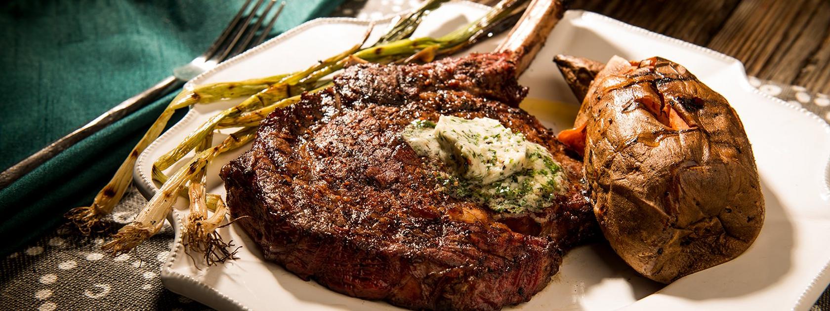 image of Smoked Rib-Eyes with Bourbon Butter