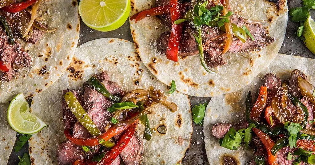 https://i8.amplience.net/i/traeger/Steak-Fajitas_Traeger-Wood-Fired-Grills_RE_HE_M?fmt=webp