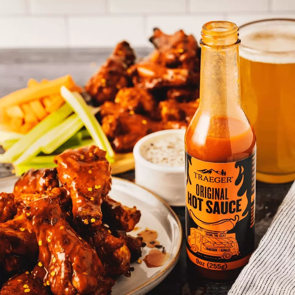 https://i8.amplience.net/i/traeger/traeger-hot-sauce-lifestyle-wings?fmt=webp