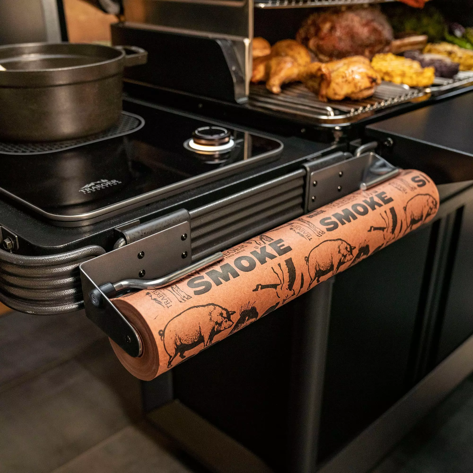 https://i8.amplience.net/i/traeger/traeger-pal-roll-rack-lifestyle-1?fmt=webp