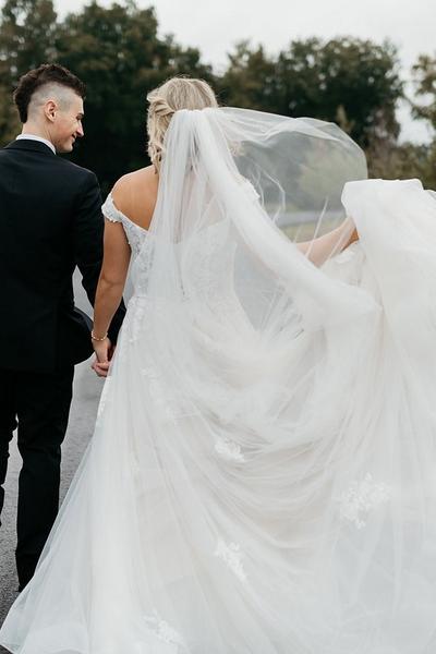 Julianna and Luke wedding portraits with veil