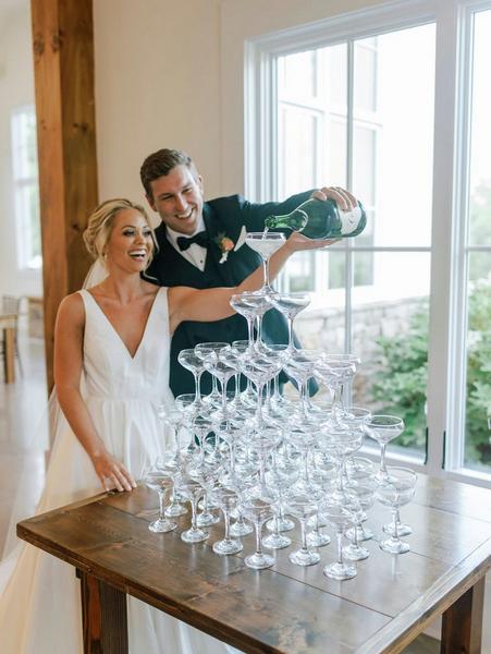 Bride and Groom pouring champagne