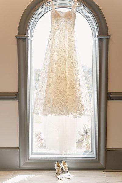 Iris Vowd Wedding dress hanging shot