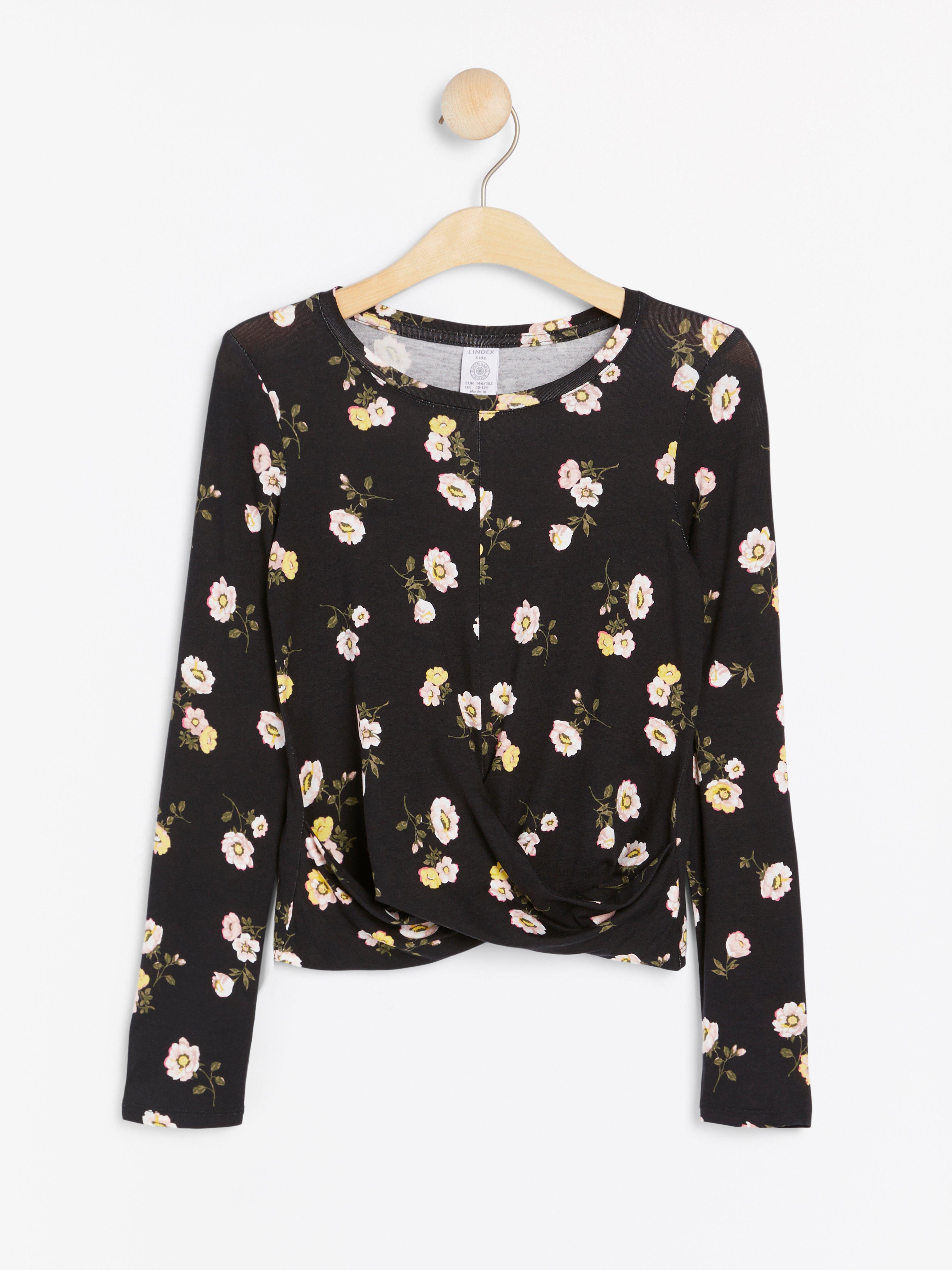 Black top with flower print and wrap detail | Lindex Europe