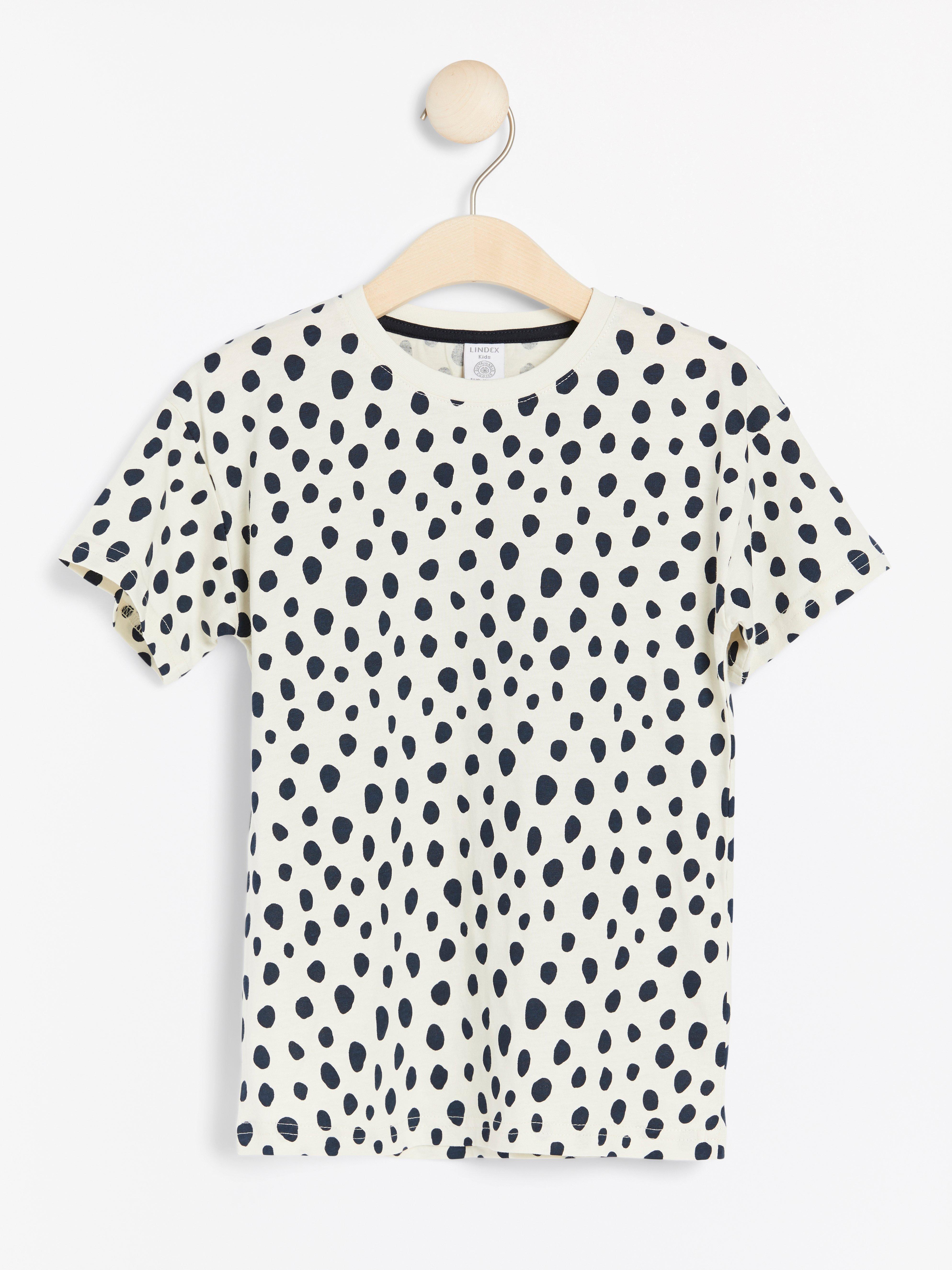 Oversized white t-shirt with black dots | Lindex UK