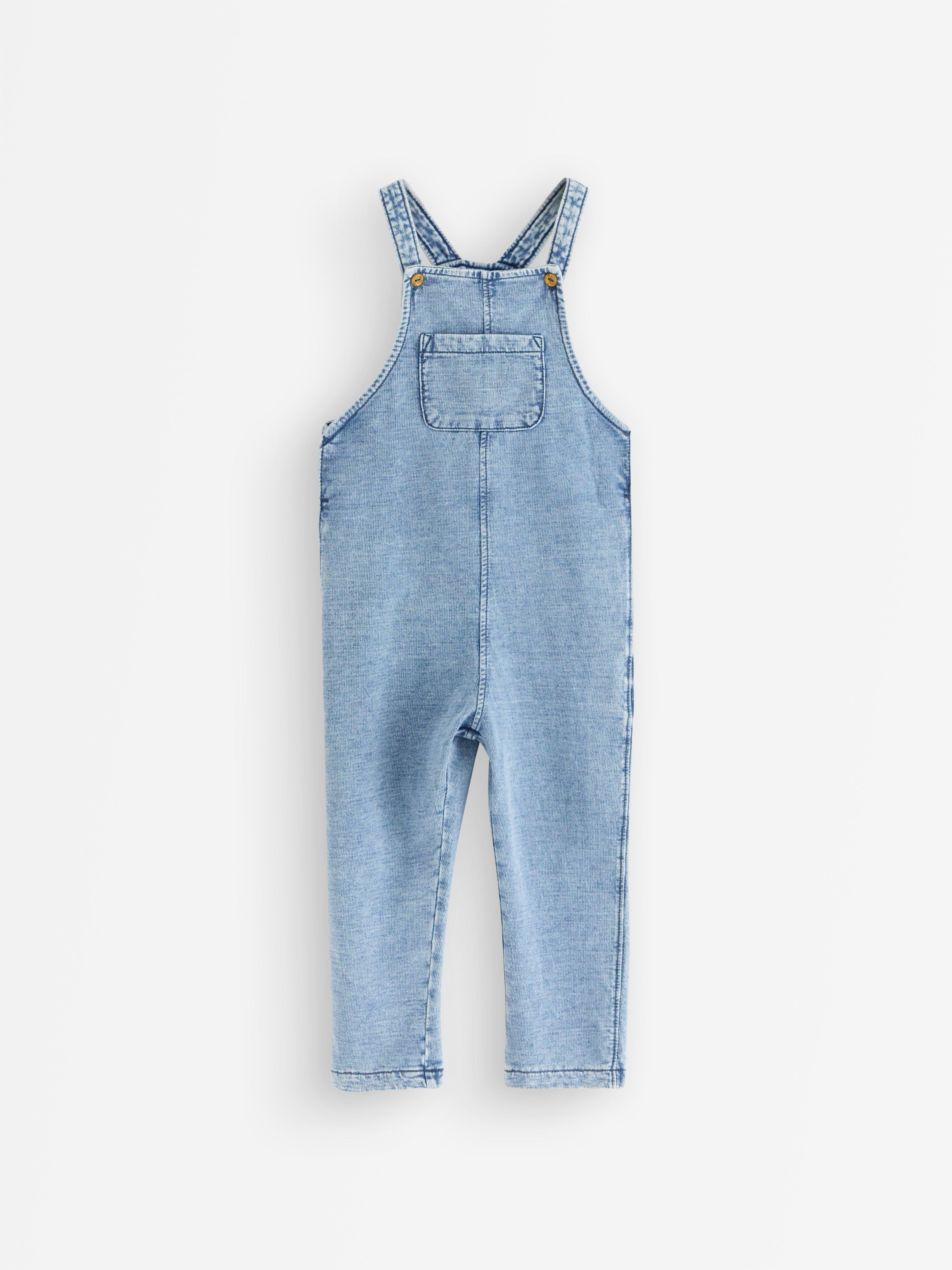 dungarees and striped top