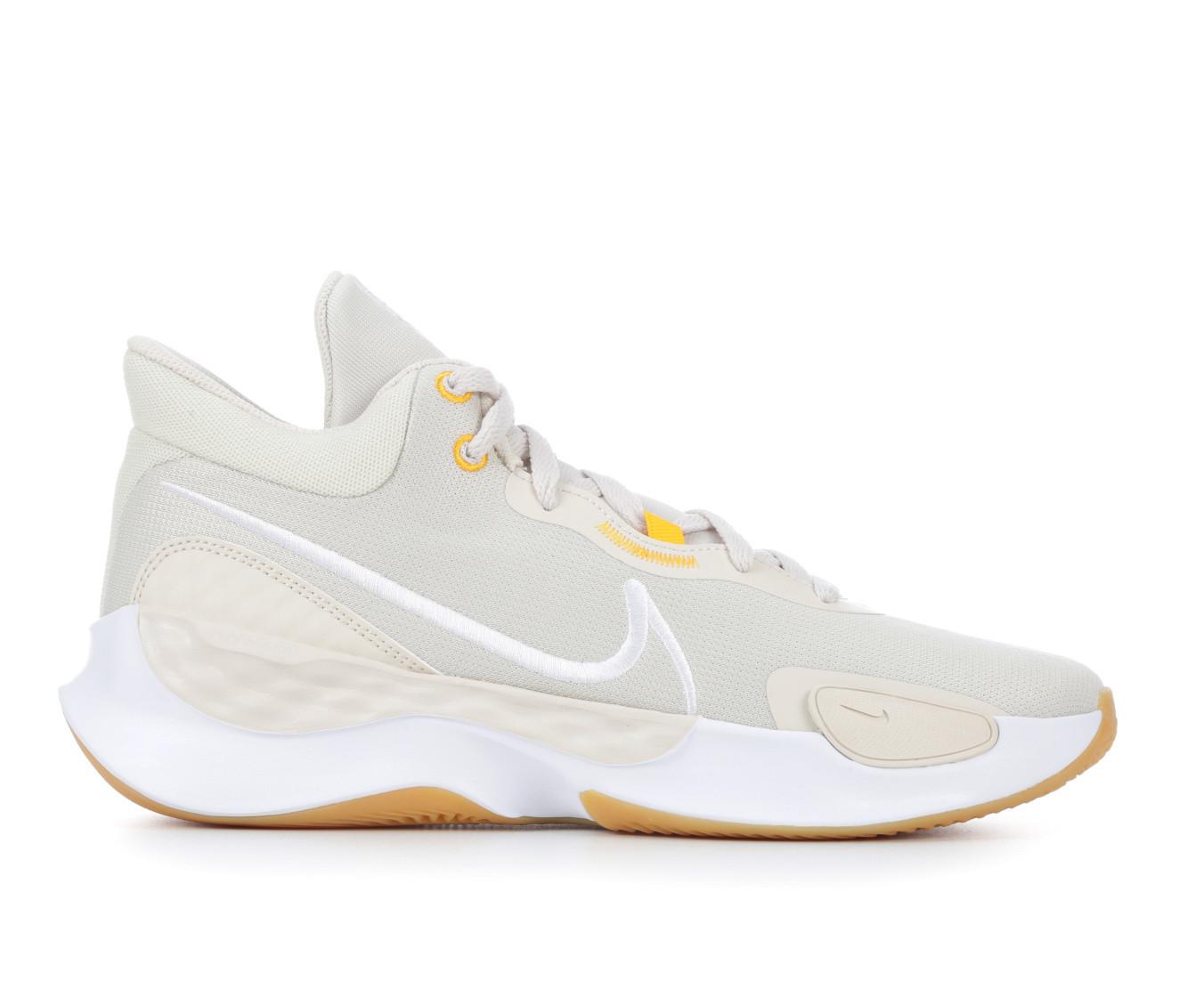 Nike white and hot sale gold basketball shoes