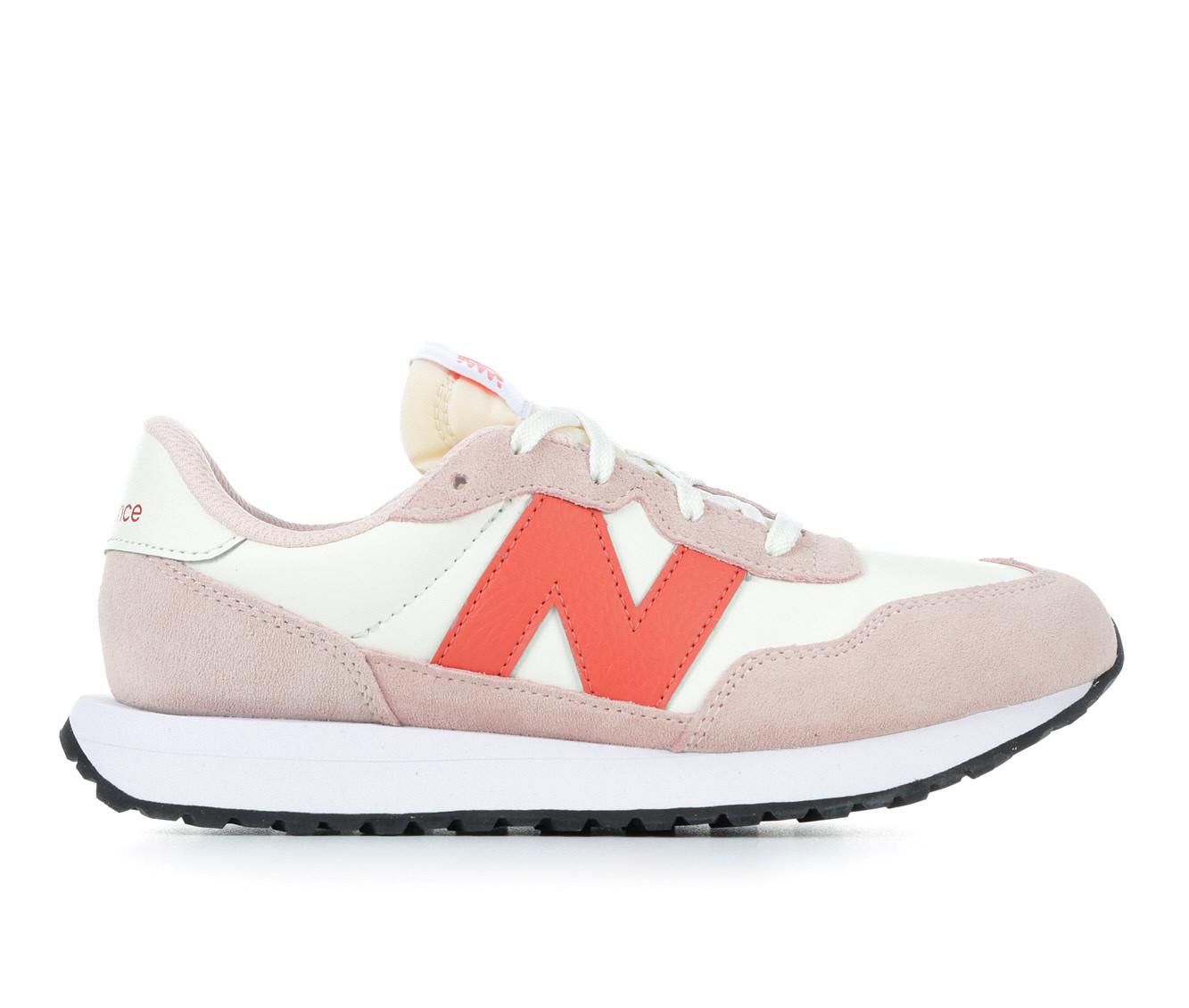 New balance on sale pink shoes