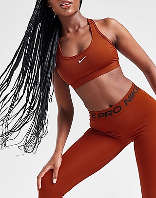 Nike Pro Training swoosh bra and leggings in navy and rose gold