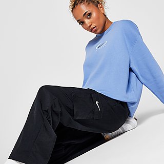 NIKE ESSENTIAL WOMEN CARGO PARASHUTE IN BLACK Nike mini swoosh cargo  trousers in black Product Details Trousers & Leggings by Nike Act c