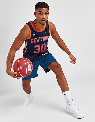 New York Knicks basketball apparel in a sporting goods store in