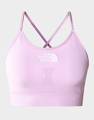 The North Face Training Tech medium support sports bra in pink tie dye  Exclusive at ASOS