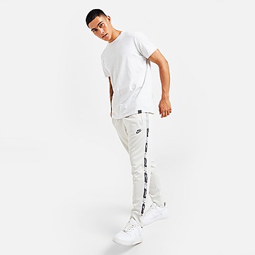 Nike pantalón de chándal Repeat Logo Poly