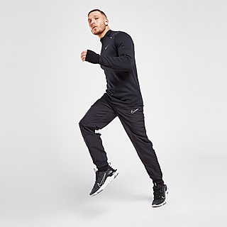 Nike Pantalon de survêtement de football tissé Nike Dri-FIT Academy pour Homme